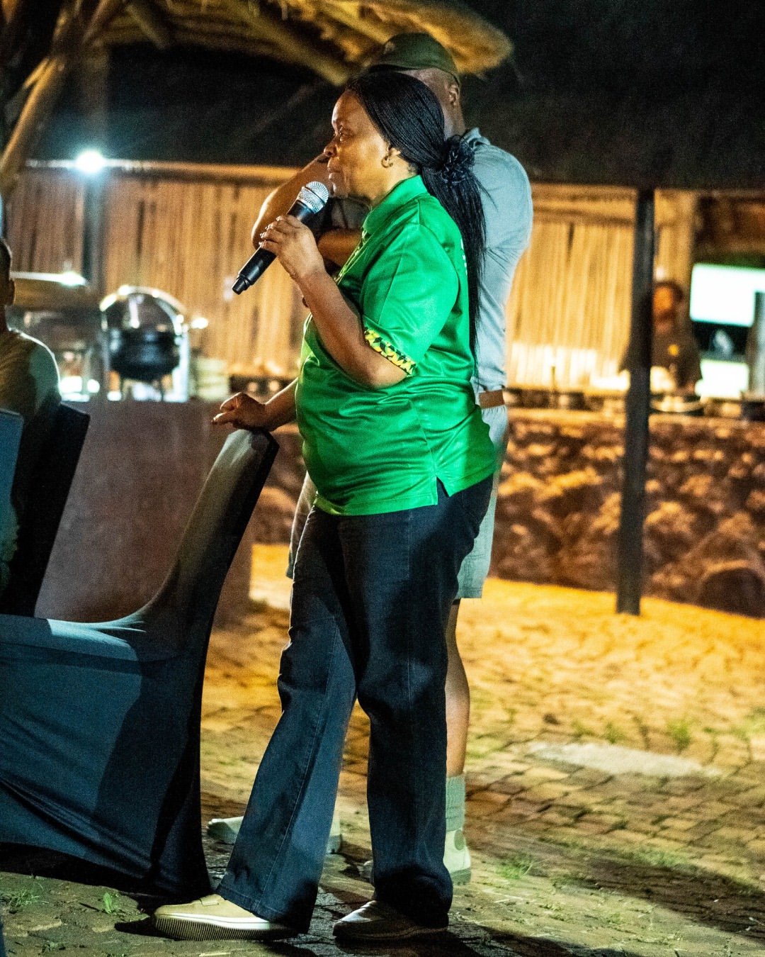 Woman speaking at event